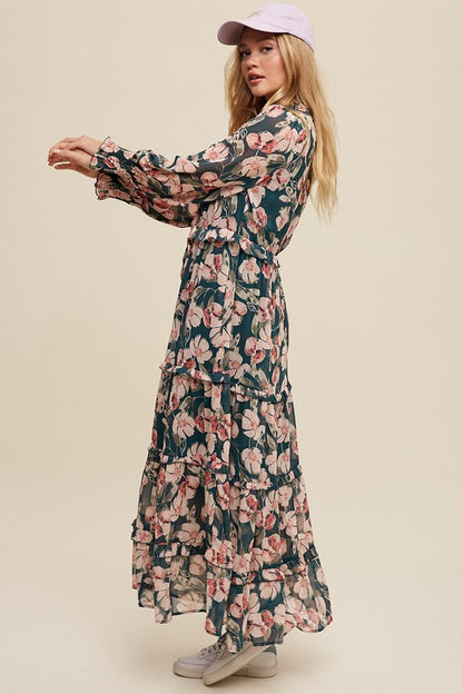 Hunter green floral maxi dress by Listicle featuring a V-neckline, ruffled tiers, and a flowing, elegant design.