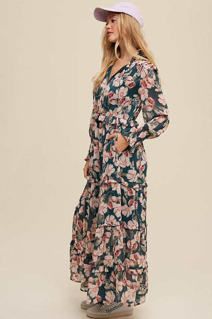 Hunter green floral maxi dress from Listicle featuring a v-neck, ruffled tiers, and a flowing silhouette.