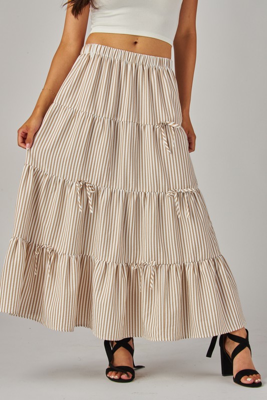 Love Poem khaki maxi skirt with stripes and bows, flowing design, perfect for casual or dressy occasions.