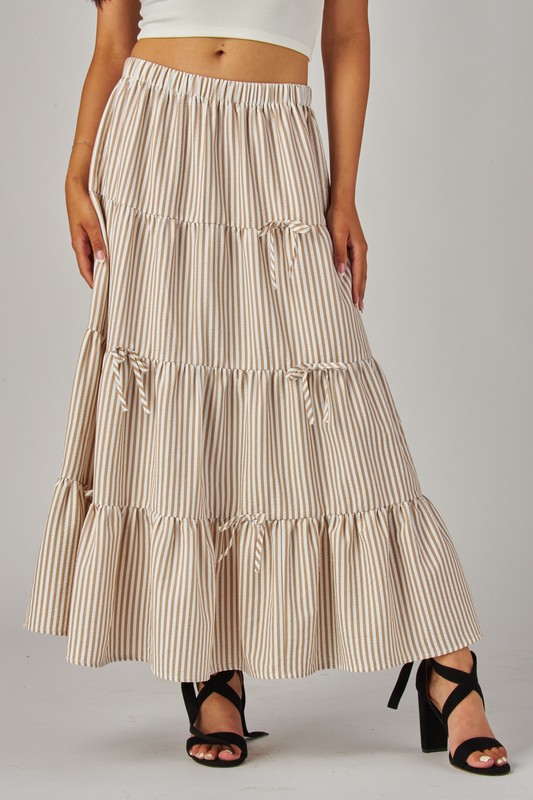 Khaki Love Poem Stripes and Bows Maxi Skirt featuring a flowy design and waist bows, perfect for casual or dressy occasions.