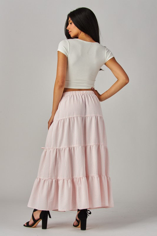 Pink Love Poem Stripes and Bows Maxi Skirt featuring a flowing design with bold stripe patterns and bow accents.