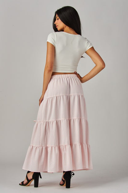 Pink Love Poem Stripes and Bows Maxi Skirt featuring a flowing design with bold stripe patterns and bow accents.