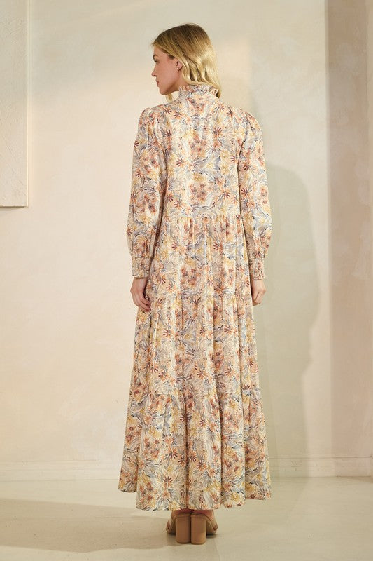 Long sleeve floral maxi dress from Lovelo, flowing design with vibrant flower print, perfect for elegant summer or spring wear.