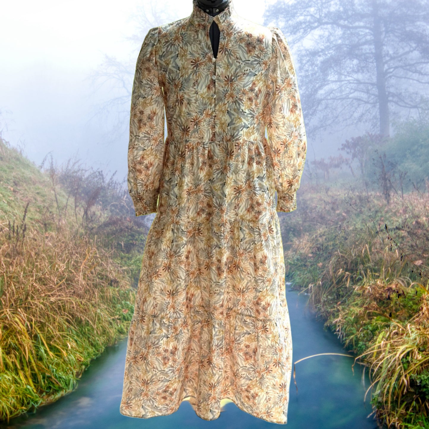 Long sleeve floral maxi dress by Lovelo, flowing fabric with vibrant flower pattern, perfect for summer or spring occasions.