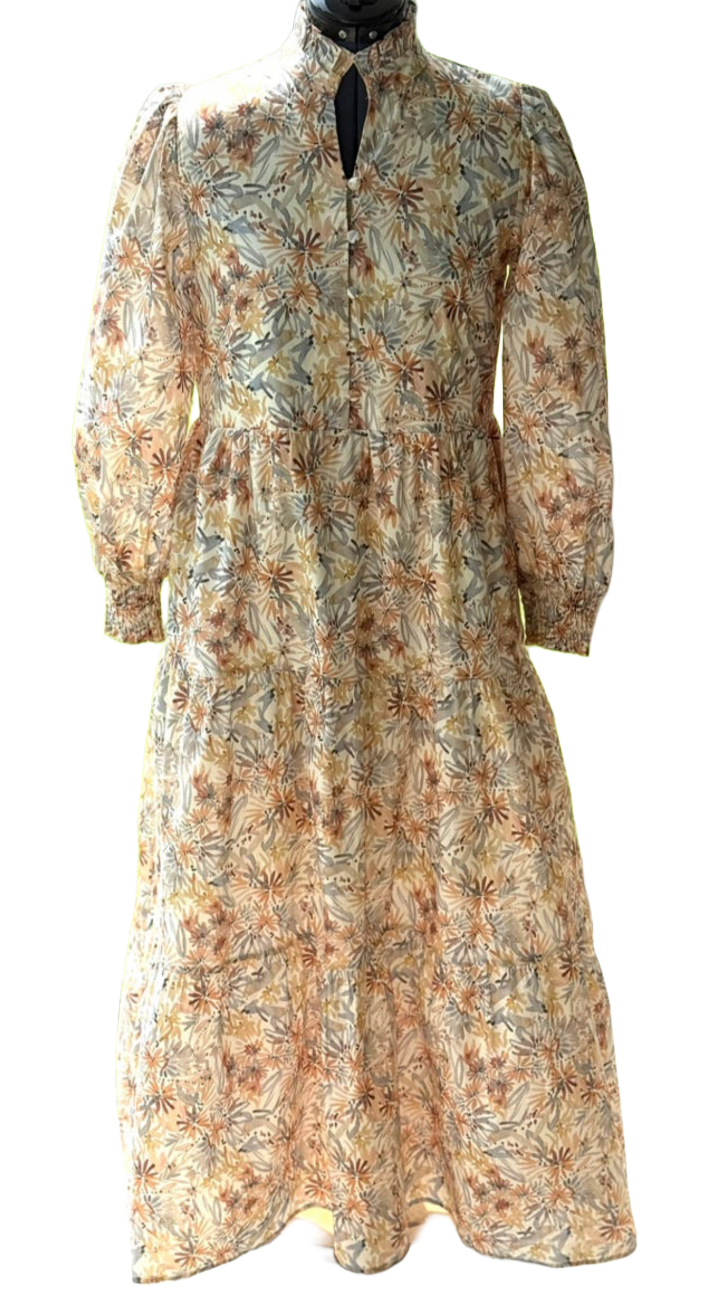 Long sleeve floral maxi dress by Lovelo featuring a vibrant floral pattern and flowing silhouette.