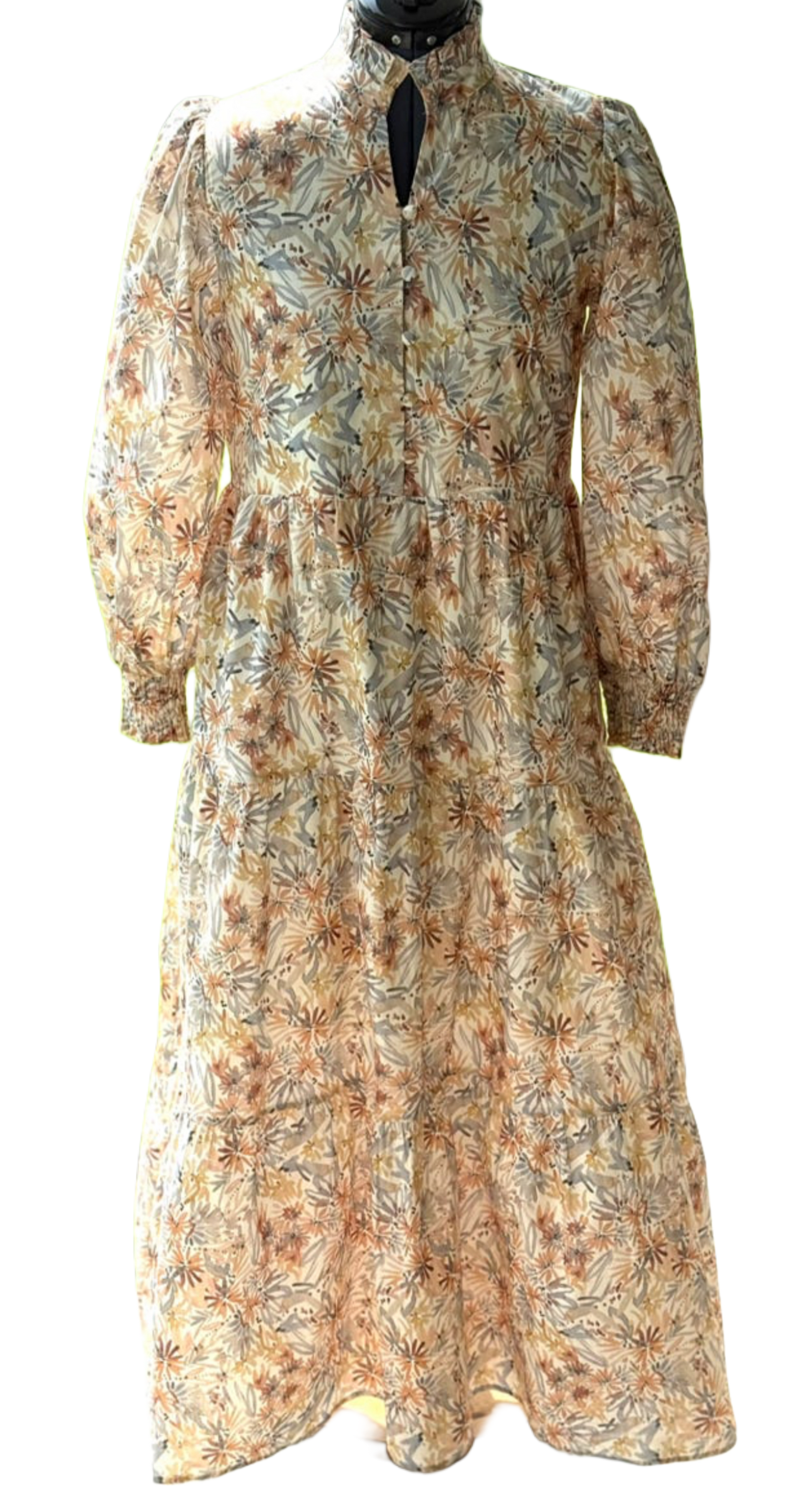 Long sleeve floral maxi dress by Lovelo featuring a vibrant floral pattern and flowing silhouette.