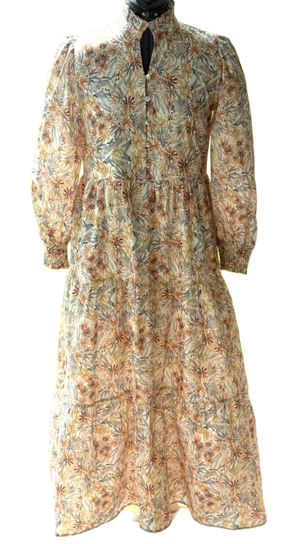 Long sleeve floral maxi dress from Lovelo featuring a flowing silhouette and vibrant flower print.