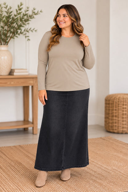 Plus-size model wearing Stone Lux long sleeve layering top with maxi skirt