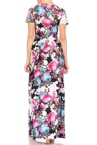 Miss M floral maxi dress with pockets, lightweight fabric, and a flowy silhouette suitable for summer or casual occasions.