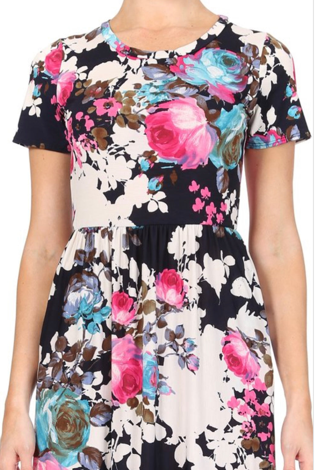 Miss M floral maxi dress with pockets, lightweight fabric, and vibrant floral pattern, perfect for summer or casual wear.