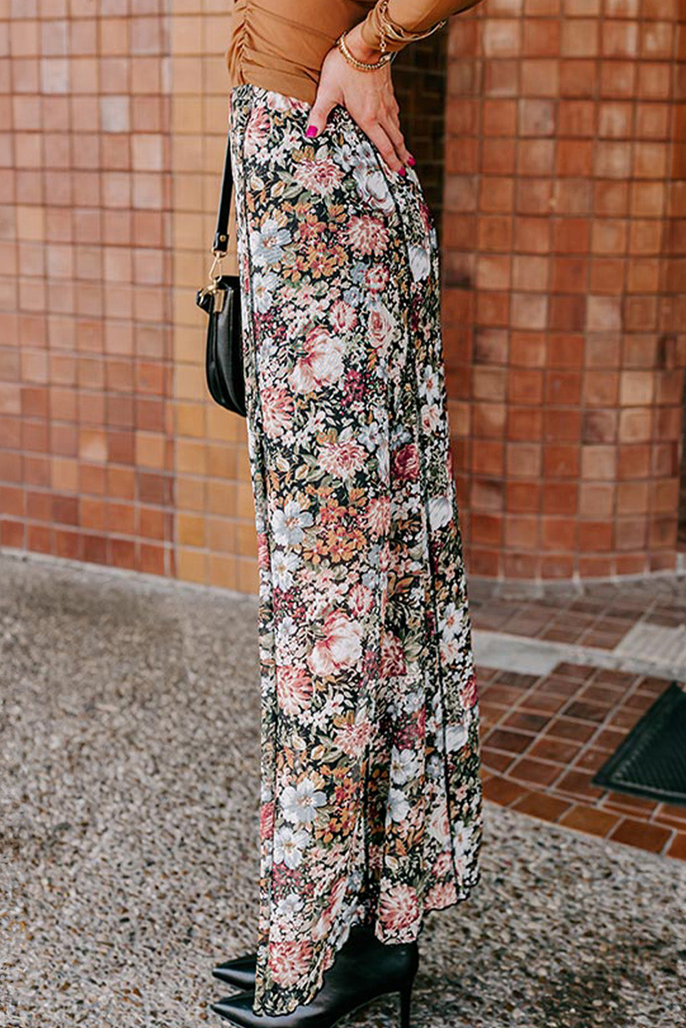 Brown floral print high waist maxi skirt by ModestAndDevoted, flowing polyester and elastane bottoms with a elegant floral design.