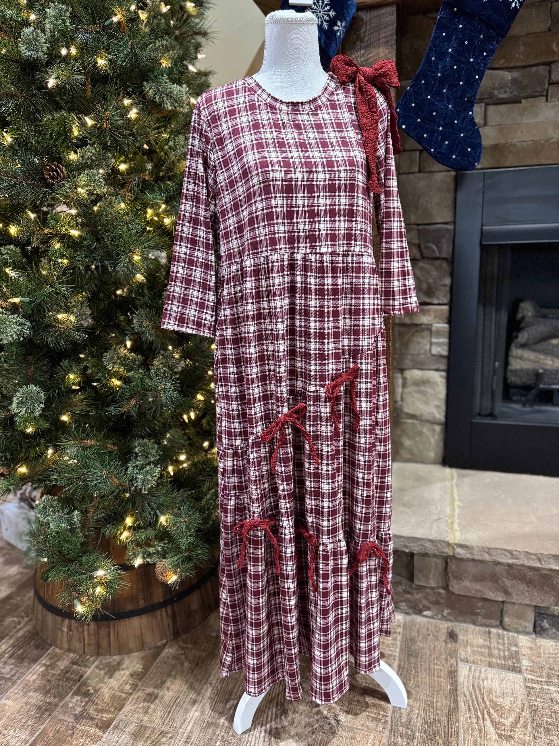Burgundy plaid and bows 3/4 sleeve dress by ModestAndDevoted, featuring a classic pattern and feminine details.