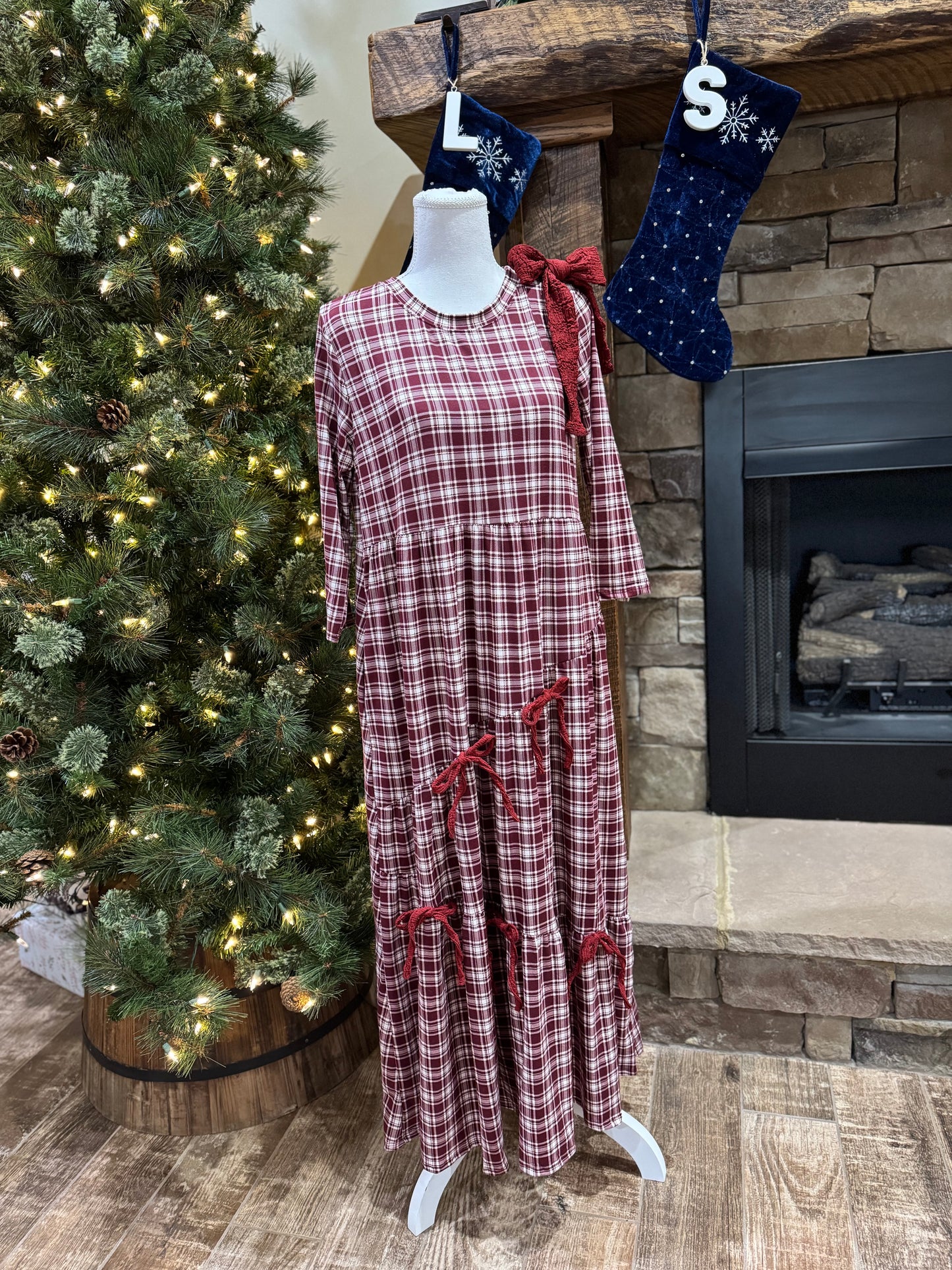 Burgundy plaid and bows 3/4 sleeve dress by ModestAndDevoted, featuring a modest design with stylish details and a classic fit.
