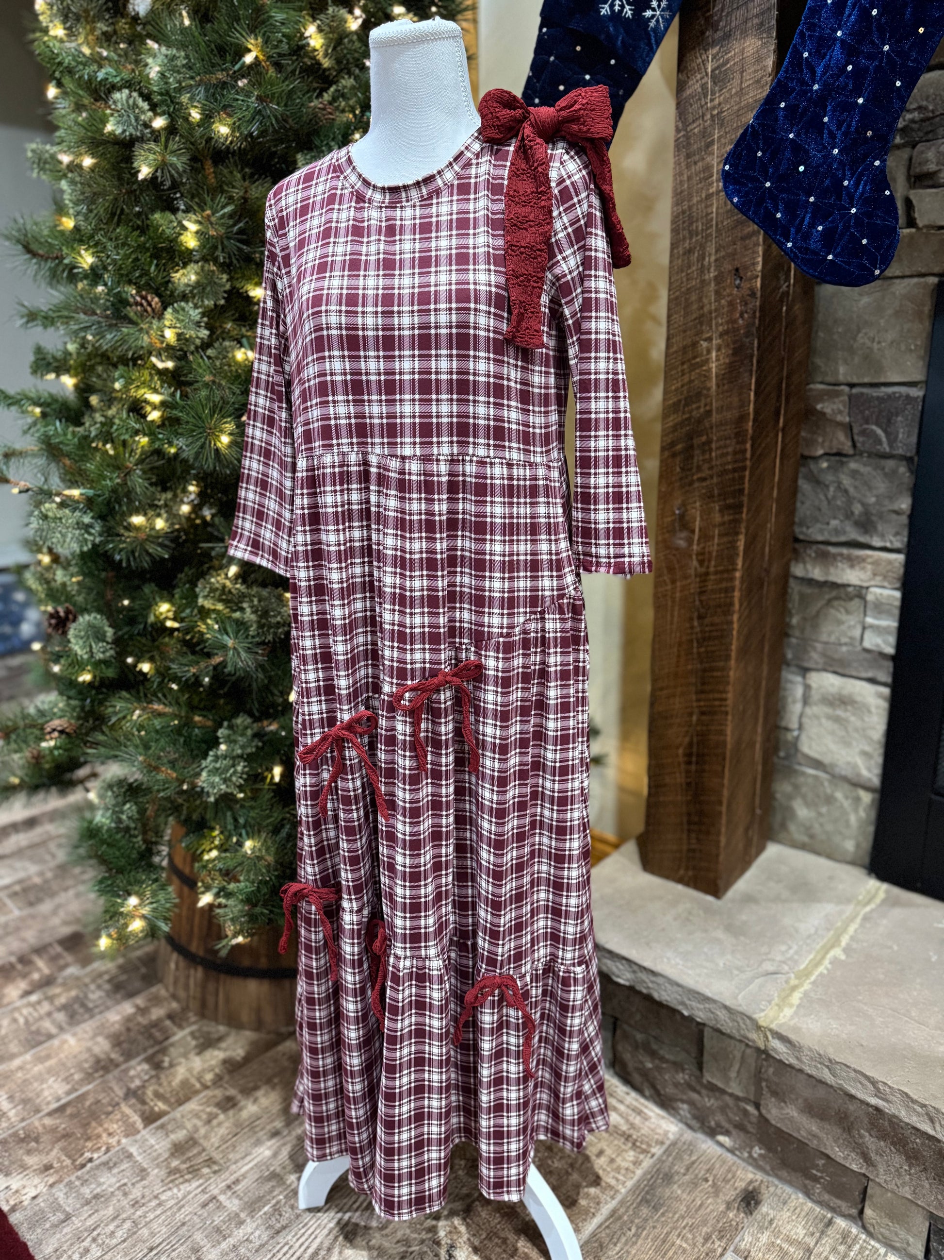Burgundy plaid and bows 3/4 sleeve dress by ModestAndDevoted, featuring a modest, stylish design with bow accents and plaid pattern.