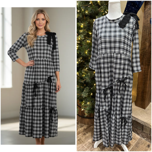 Burgundy plaid and bows 3/4 sleeve dress by ModestAndDevoted, featuring a stylish, modest design with bow accents and plaid pattern.