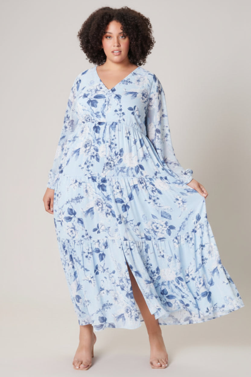 Blue denim floral maxi dress by ModestAndDevoted featuring a flowing silhouette and floral patterns.