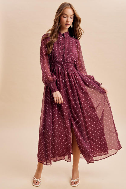 ModestAndDevoted polka dot maxi dress with pintuck pleats and elegant design, perfect for sophisticated occasions.