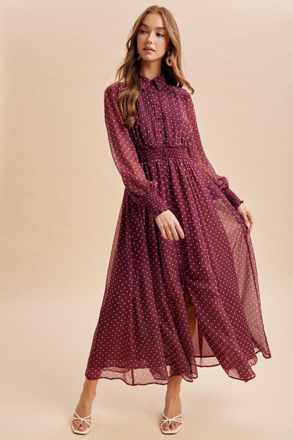 Elegant polka dot maxi dress by ModestAndDevoted featuring pintuck pleats and a flowing silhouette for a sophisticated look.