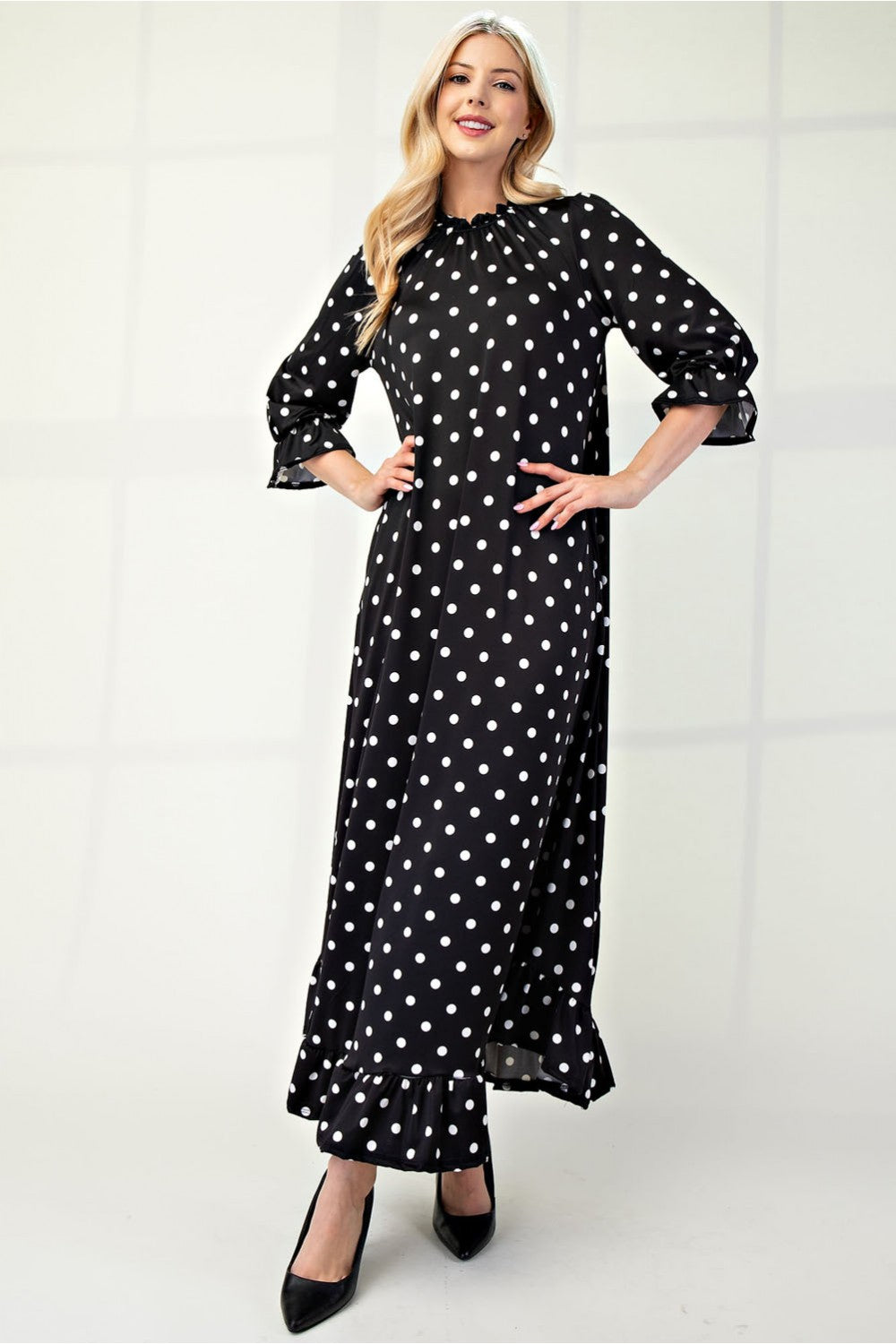 Polka dot 3/4 sleeve ruffle trim dress by ModestAndDevoted, plus size, featuring a stylish and feminine design.