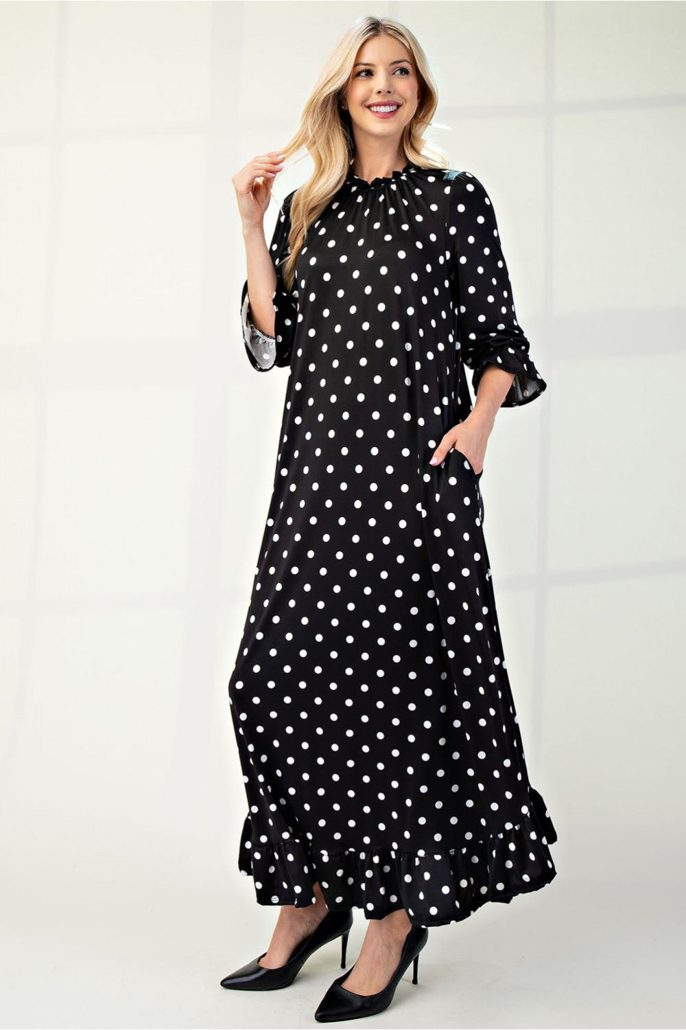 Polka dot 3/4 sleeve ruffle trim dress by ModestAndDevoted, stylish plus-size dress with feminine ruffle details.