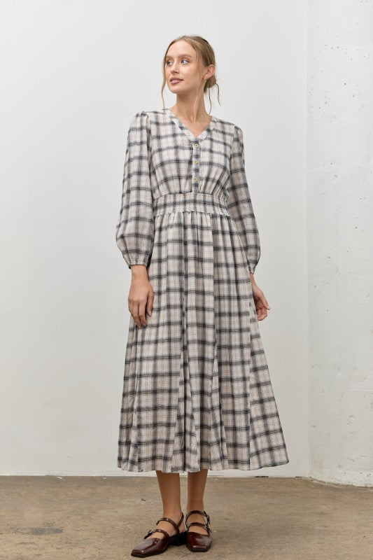 Windowpane checked V-neck maxi dress by Polagram, featuring a modest, flowing design with long sleeves and a stylish pattern.