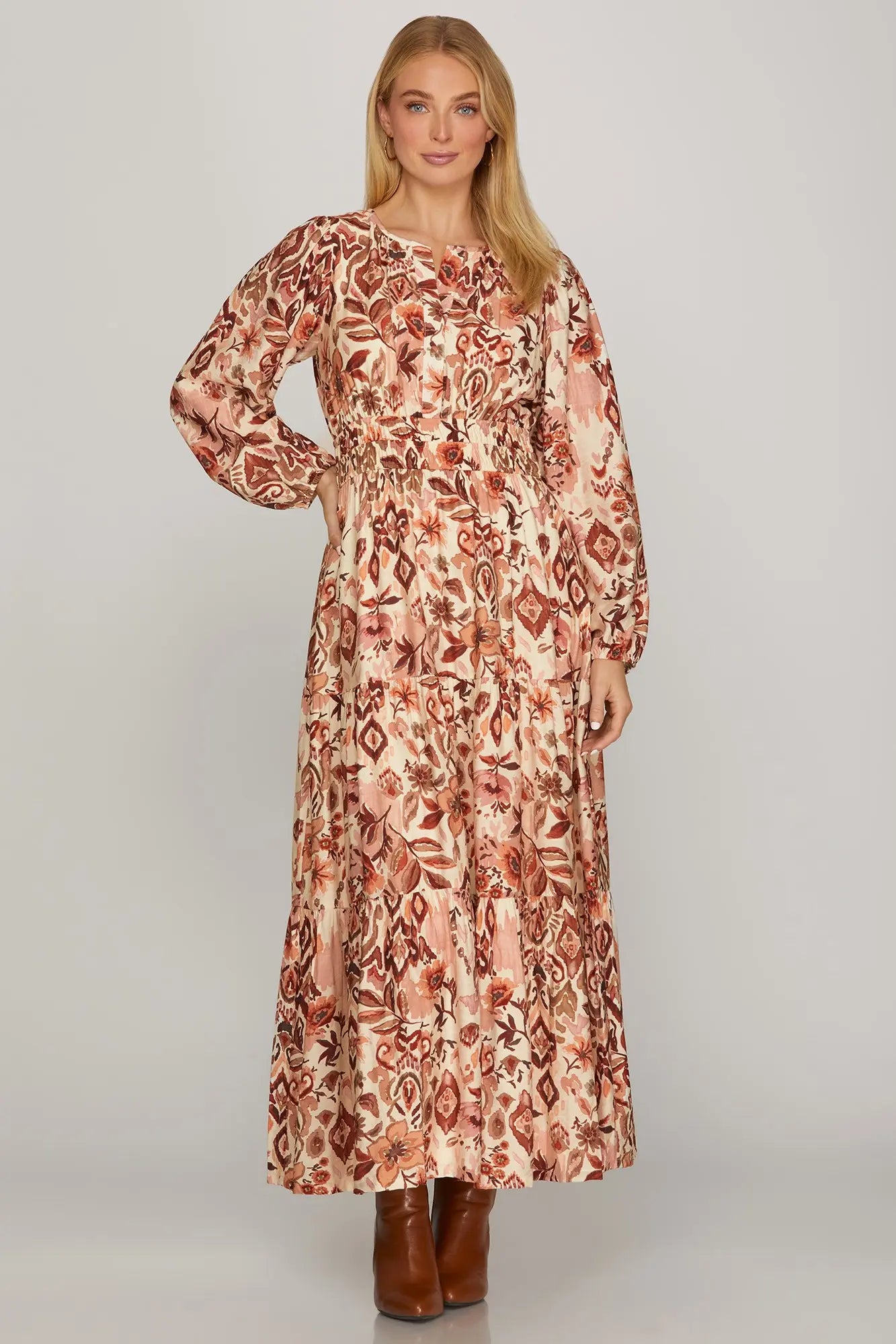 ModestAndDevoted boho fall abstract floral long sleeve maxi dress in brick rose, showcasing a flowing, patterned design for women.