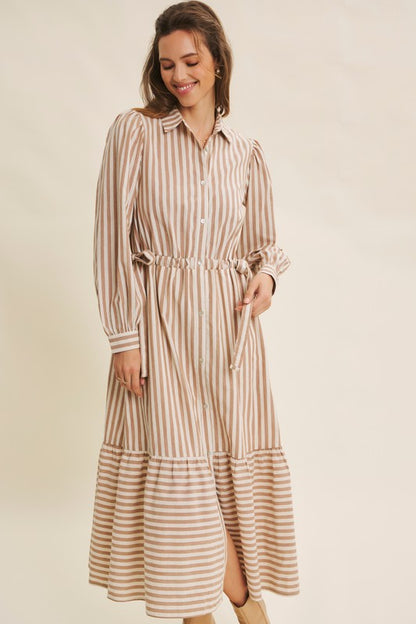 Deep green cotton striped maxi dress by ModestAndDevoted featuring button-down front and waist belt for a classic, elegant look.