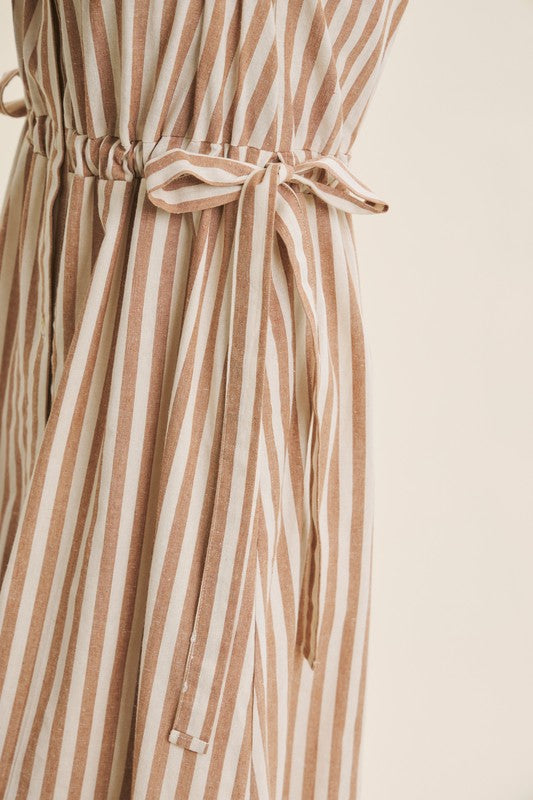 Deep green cotton stripe maxi dress with button-down front and belt from ModestAndDevoted, featuring classic style and relaxed fit.