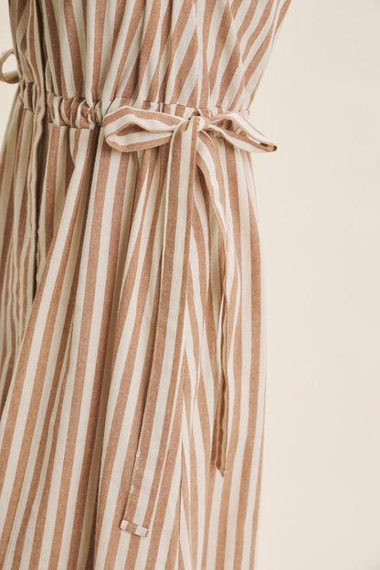 Deep green cotton stripe maxi dress with button-down front and belt from ModestAndDevoted, featuring classic style and relaxed fit.