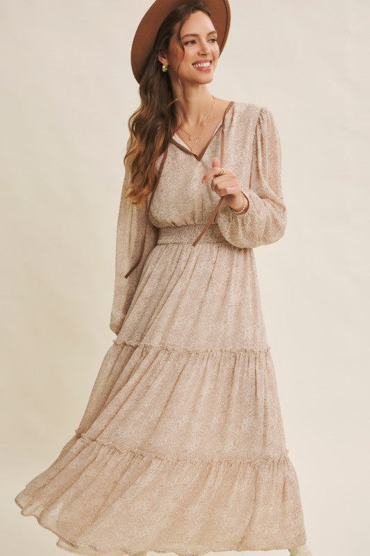 ModestAndDevoted romantic flora maxi dress in dusty blue with a smocked waist and flowing fabric, perfect for elegant occasions.