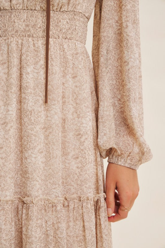 Dusty blue Romantic Flora Maxi Dress by ModestAndDevoted with smocked waist, flowing fabric, and floral print.