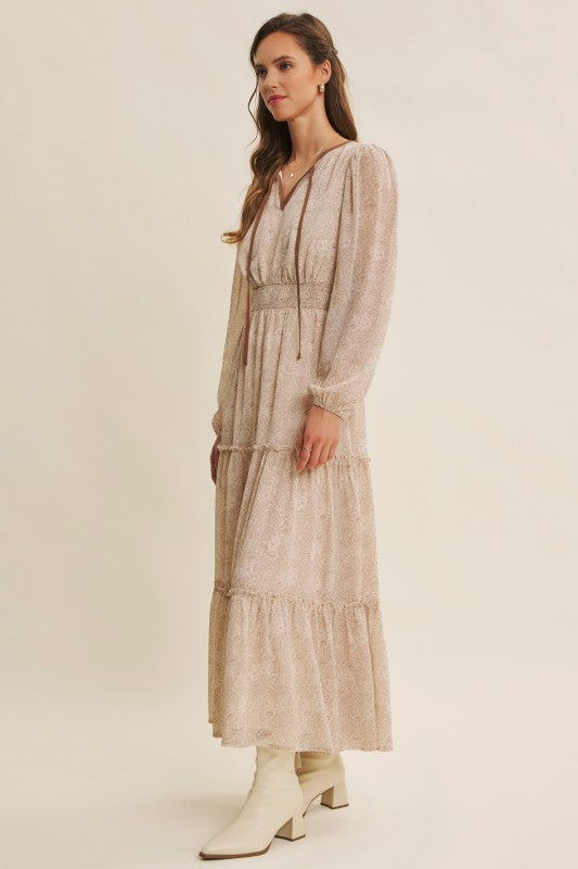 Dusty blue Romantic Flora Maxi Dress with smocked waist from ModestAndDevoted, featuring flowy fabric and floral print.