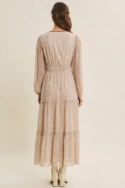 Dusty blue Romantic Flora Maxi Dress by ModestAndDevoted with a smocked waist, flowing fabric, and floral pattern.