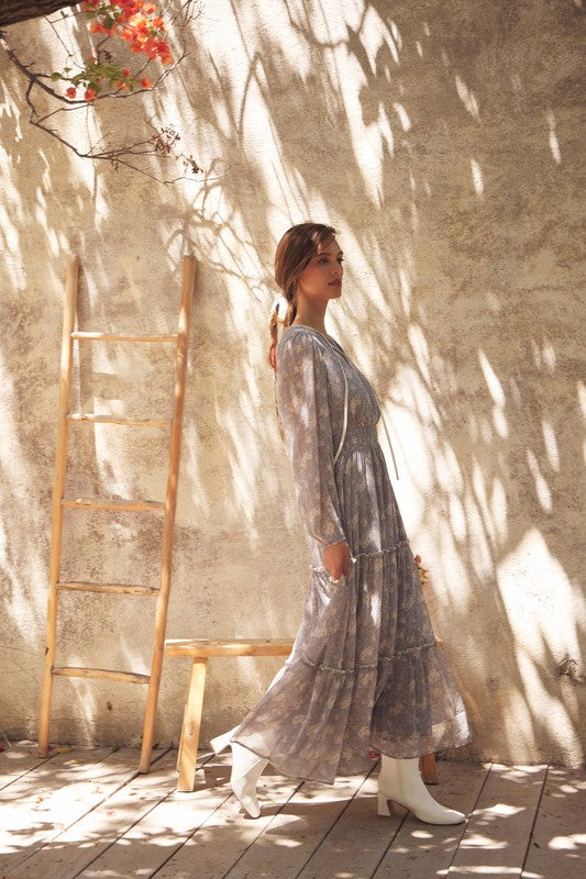 Dusty blue Romantic Flora Maxi Dress by ModestAndDevoted featuring a smocked waist and flowing fabric for elegant style.
