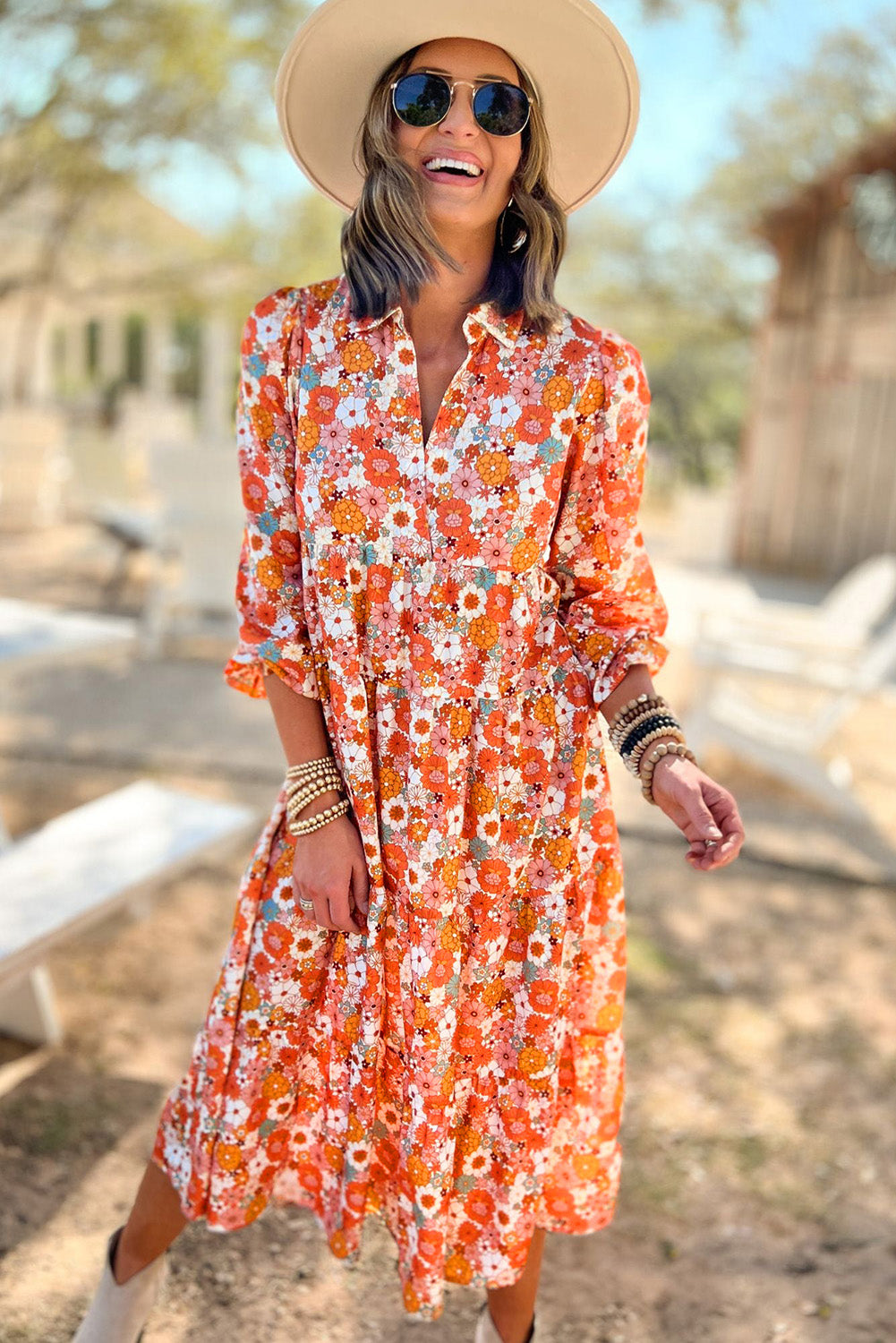 Multicolor boho floral collared long sleeve ruffled dress by ModestAndDevoted, featuring vibrant floral patterns and a feminine silhouette.