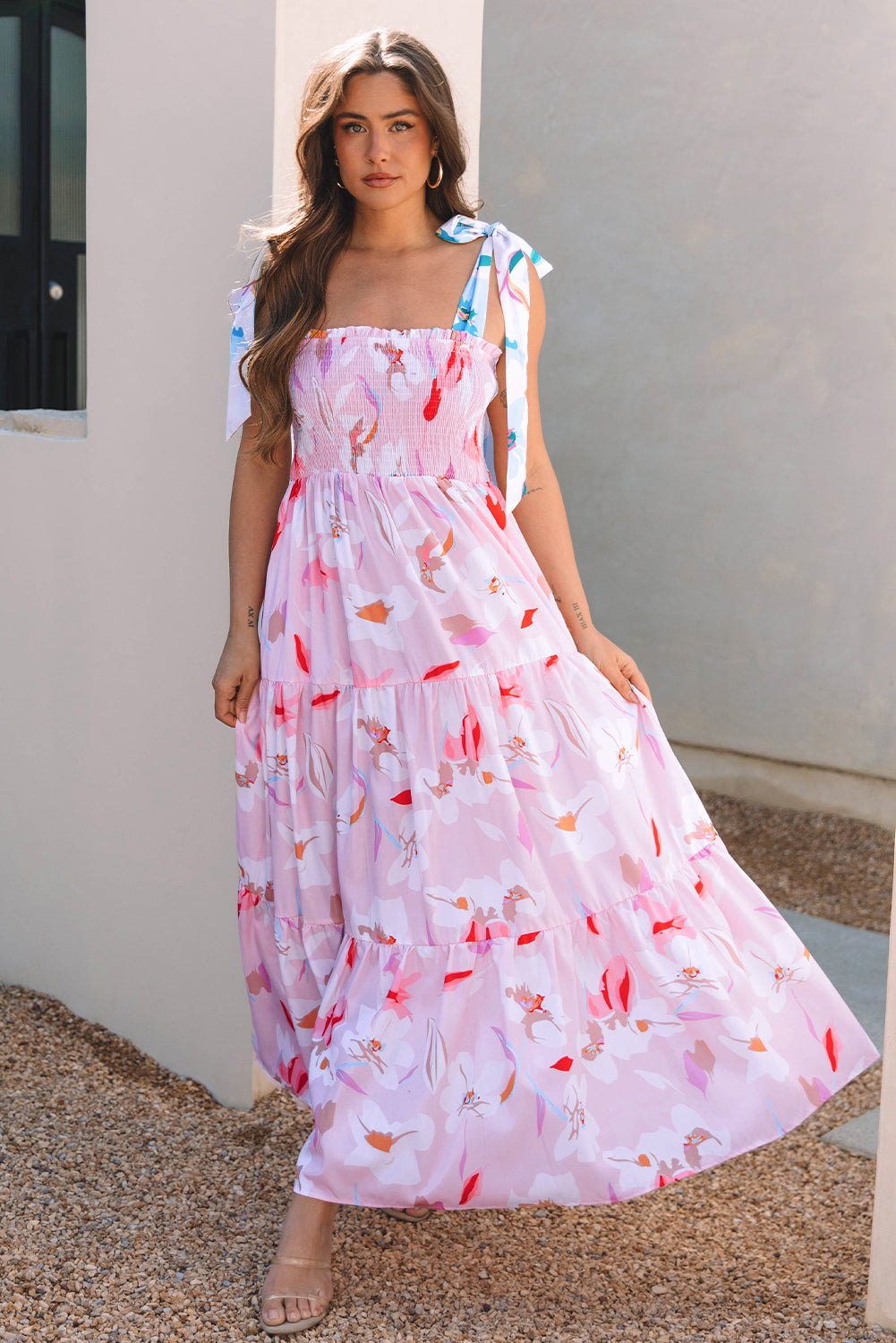 Pink floral print maxi dress with knotted shoulder straps and smocked bodice by ModestAndDevoted, perfect for elegant summer wear.