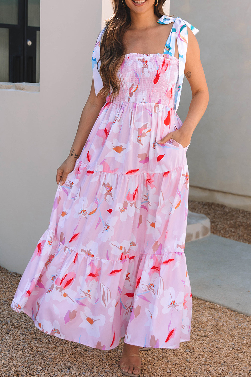 Pink floral print maxi dress with knotted shoulders and smocked bodice by ModestAndDevoted, perfect for casual or summer wear.