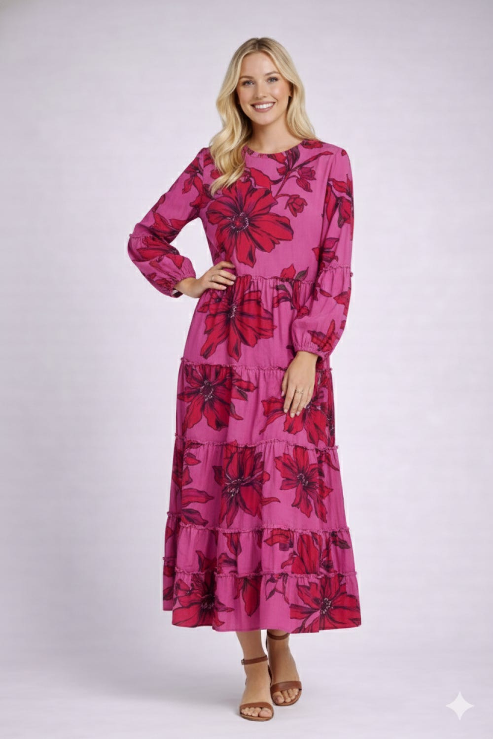 Green ModestAndDevoted floral long sleeve tiered maxi dress with a modest, flowing silhouette and layered design.
