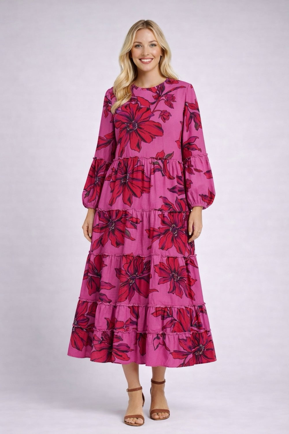 Green ModestAndDevoted floral long sleeve tiered maxi dress, flowing and elegant for modest fashion style.