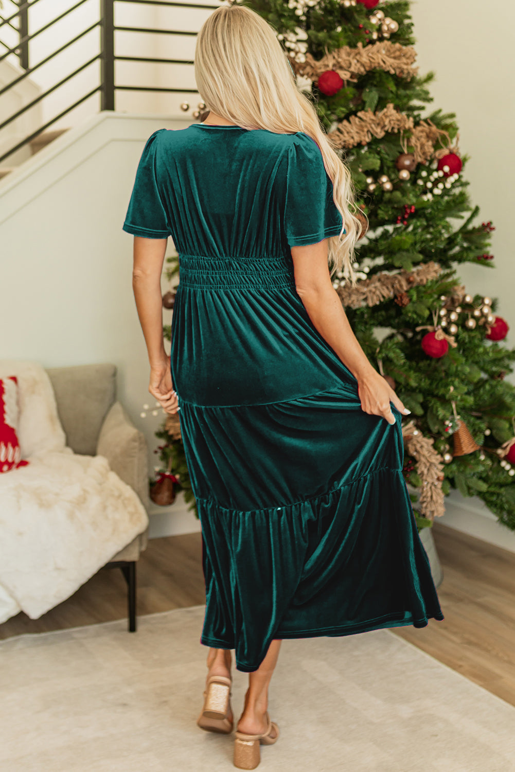 Red Dahlia velvet maxi dress by ModestAndDevoted featuring short sleeves, shirred waist, and tiered skirt in a rich red color.