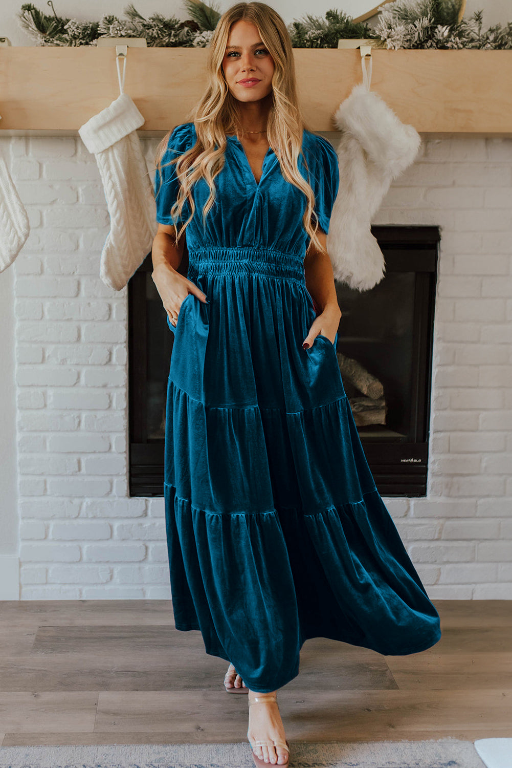Red Dahlia velvet maxi dress by ModestAndDevoted featuring short sleeves, shirred waist, and tiered skirt for elegant style.