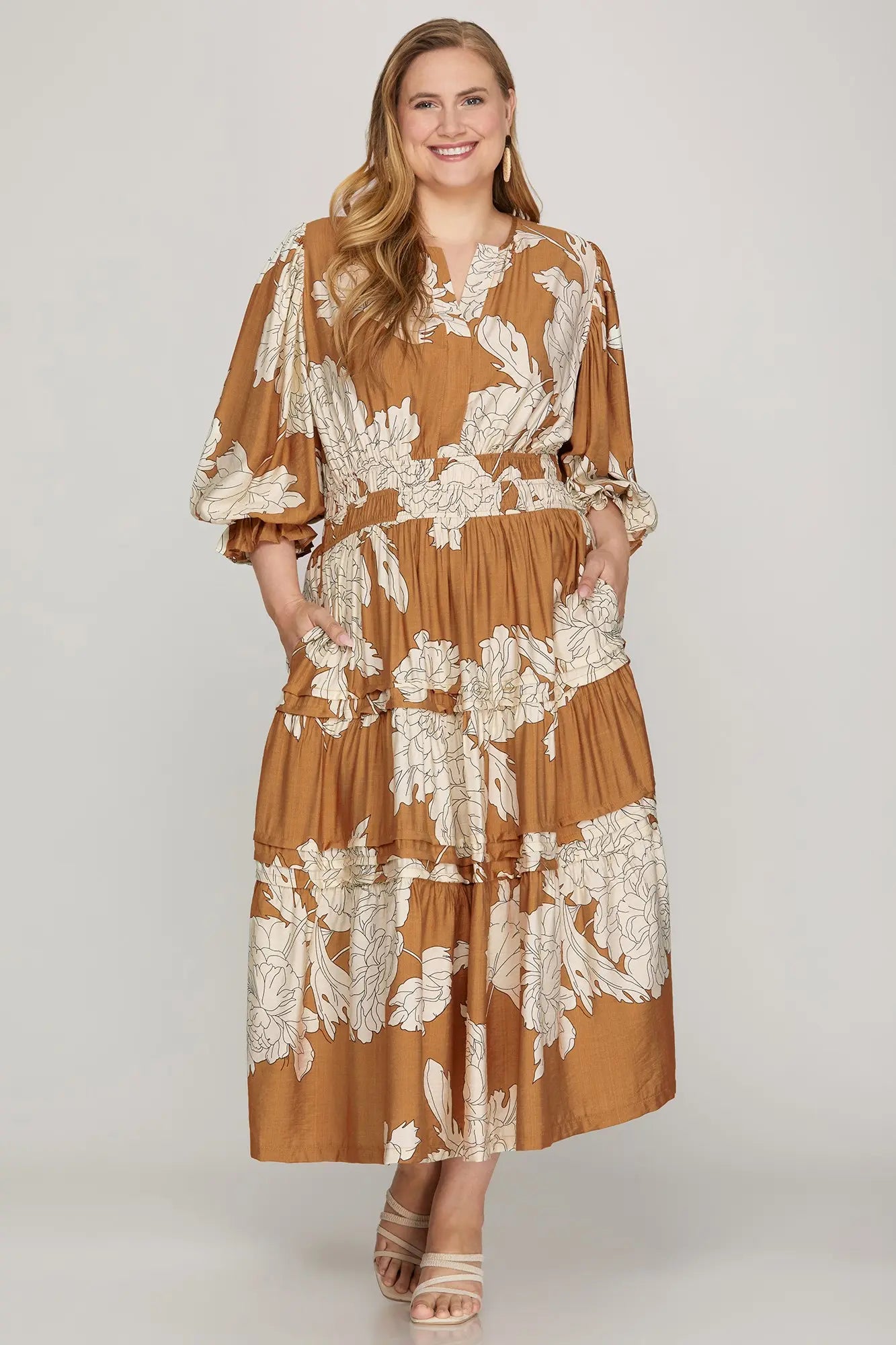 Plus Pintuck Tiered Floral Print Dress by ModestAndDevoted, caramel maxi dress with tiered design and floral pattern.
