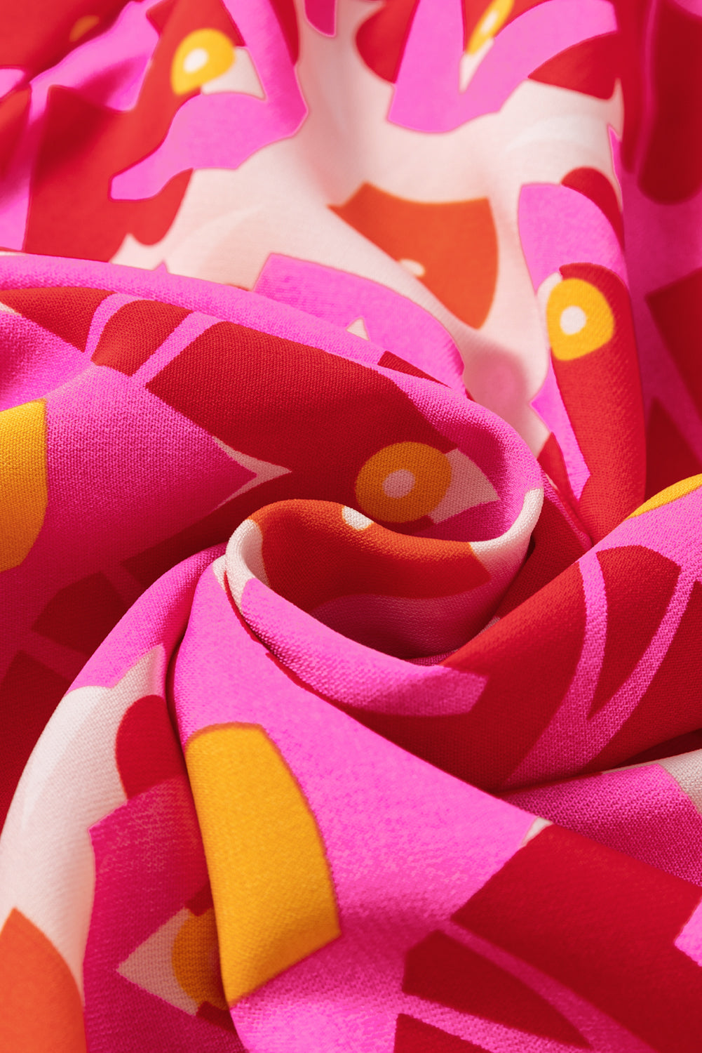 Strawberry pink Geo print V-neck maxi dress by ModestAndDevoted, flowing polyester dress with a stylish geometric pattern.
