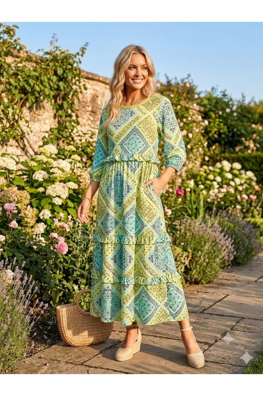 Bluebell paisley ruffle tiered maxi dress from ModestAndDevoted, perfect for summer, featuring a flowy, layered design.