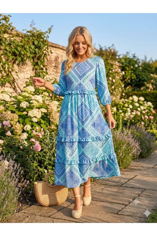 Bluebell paisley ruffle tiered maxi dress by ModestAndDevoted featuring flowing fabric and tiered ruffle details.