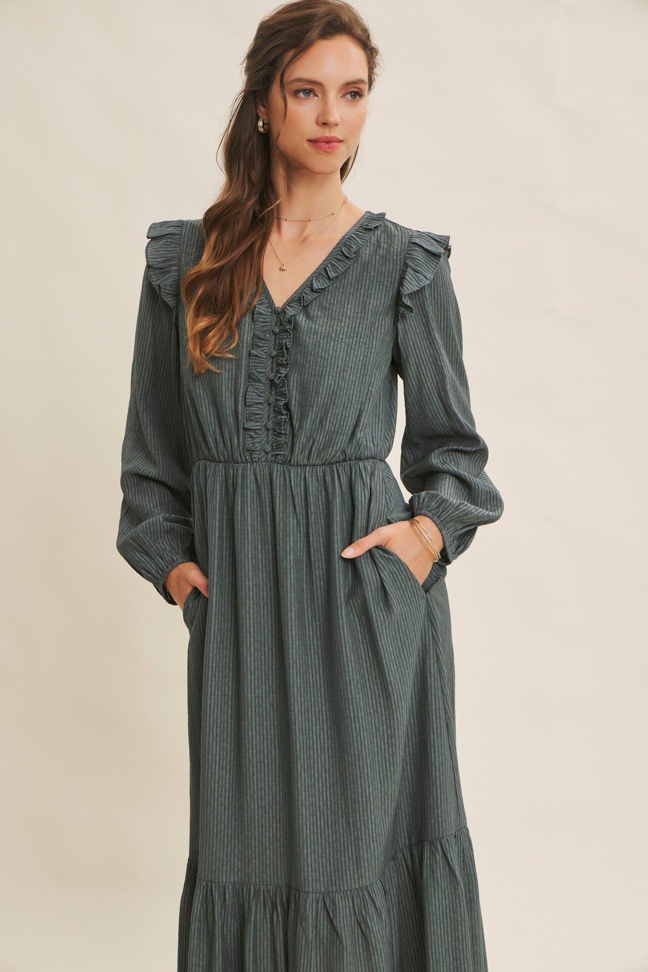 Dusty mauve romantic twist textured button-down maxi dress from ModestAndDevoted, featuring elegant flowing fabric and long sleeves.