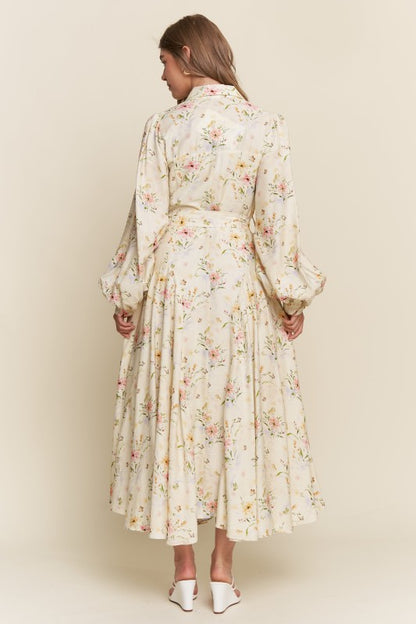 ModestAndDevoted Enchanted Garden floral maxi dress with button-down front, flowing fabric, and garden-inspired floral pattern.