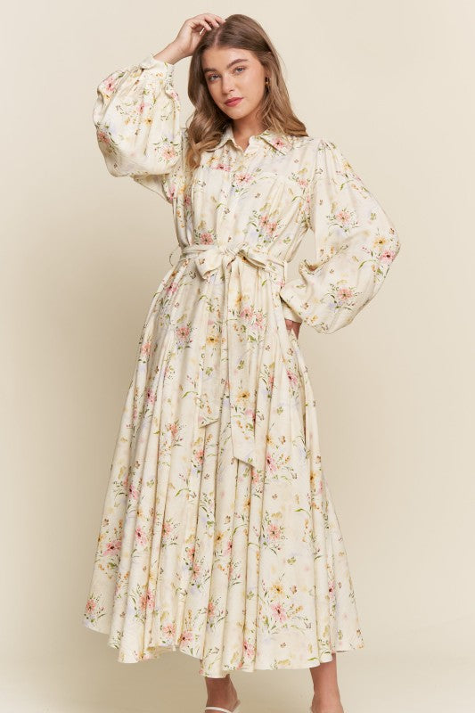 ModestAndDevoted floral maxi dress with button-down front featuring an enchanted garden floral pattern, flowing and elegant.