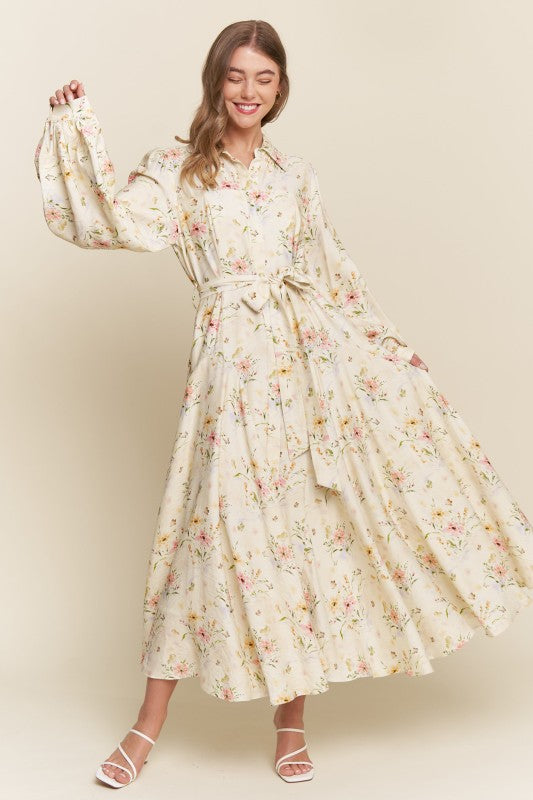 ModestAndDevoted floral maxi dress with a button-down front, featuring an enchanted garden-inspired floral pattern.