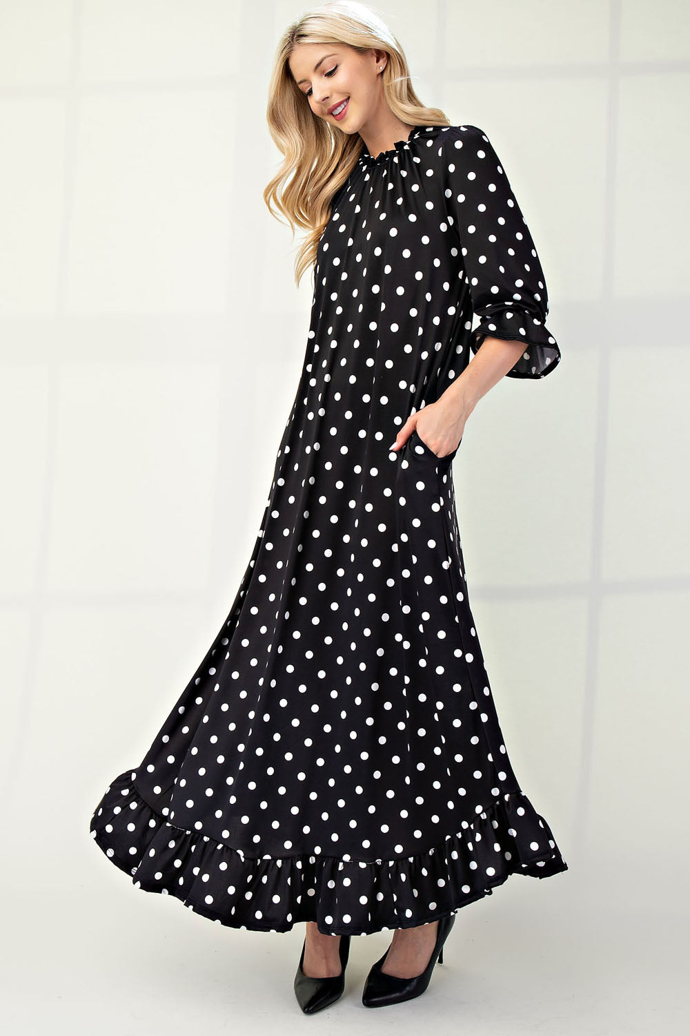 Polka dot 3/4 sleeve ruffle trim dress by ModestAndDevoted, featuring a classic dress style in missy size.